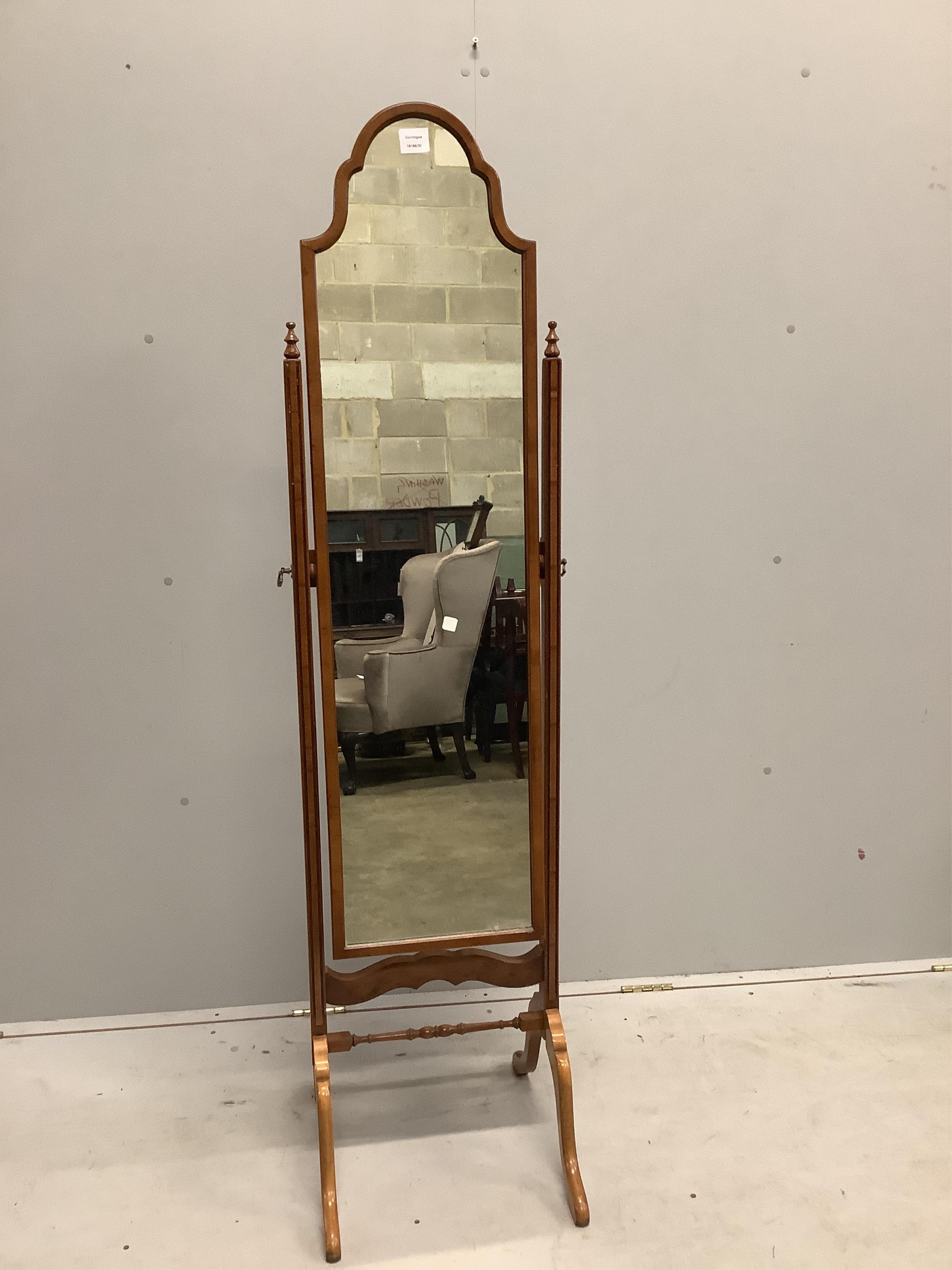 A Liberty & Co. mahogany and yew cheval mirror, height 163cm. Condition - good